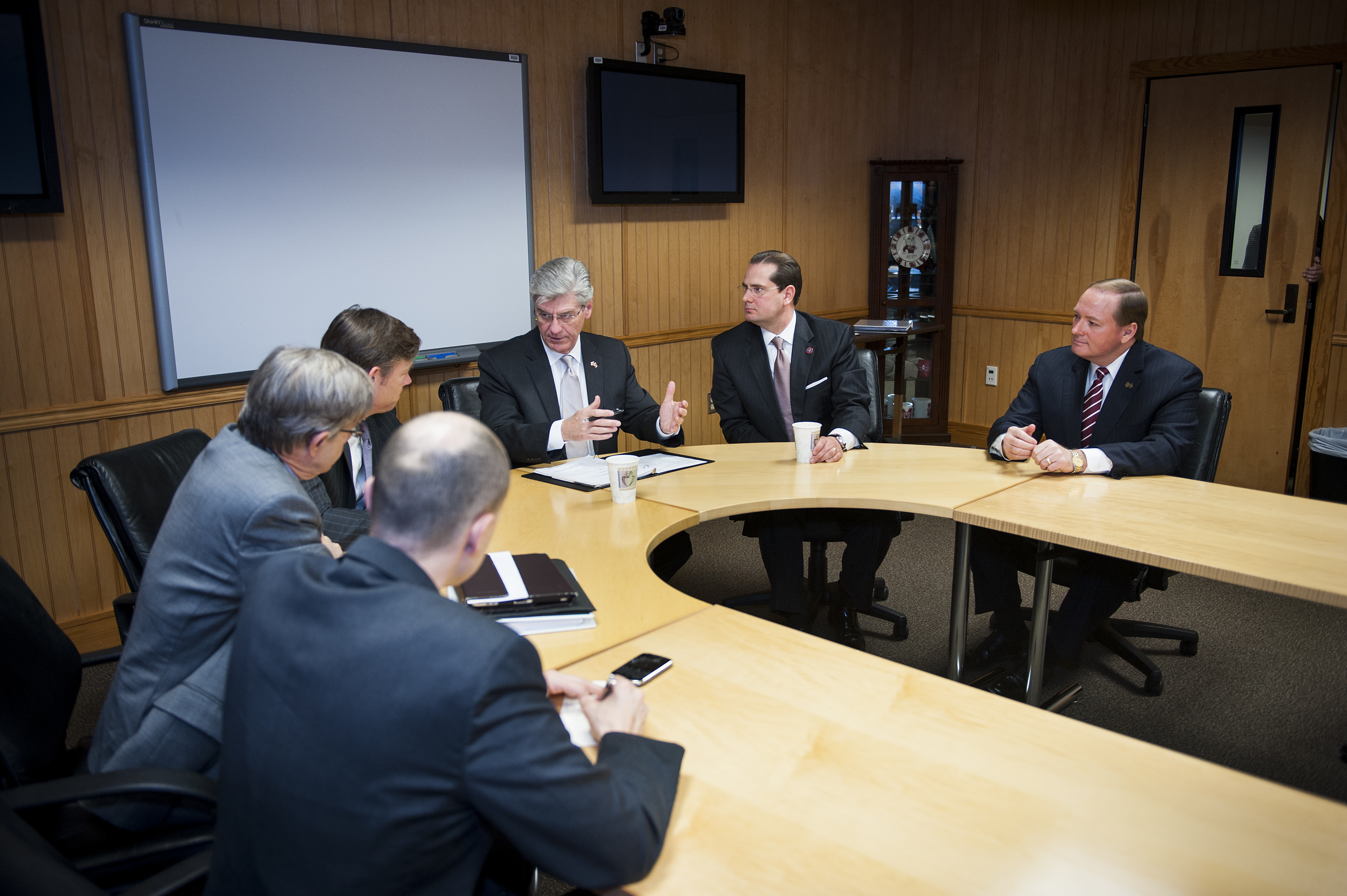 Mississippi Gov. Phil Bryant (center, gesturing) was among speakers for MSU's 2013 Manufacturing Summit. Among other participants were (from left) Doug O'Brien,  U.S. Department of Agriculture; Earl Gohl, Appalachian Regional Commission; Matt Erskine, acting assistant secretary of economic development, U.S. Department of Commerce; Chris Masingill, federal co- Clarksdale-based Delta Regional Authority; and MSU President Mark E. Keenum.