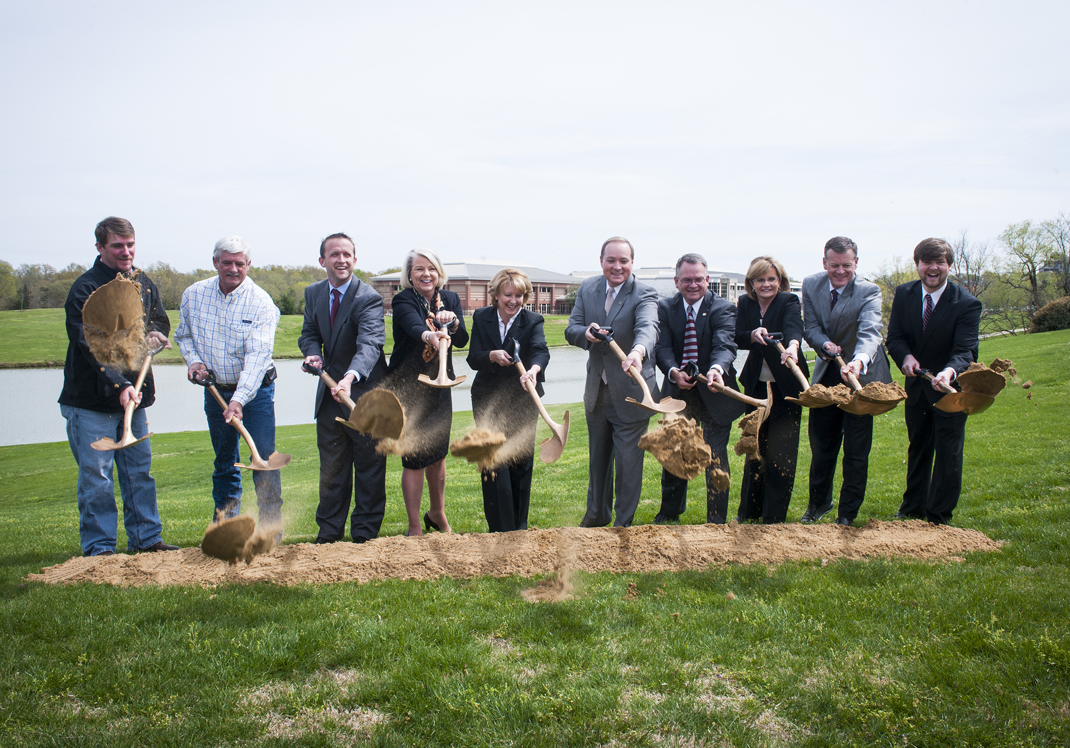 Those participating in the groundbreaking ceremony for the Chadwick Lake walking track were, from left. Stephen Weathers and Gary Weathers, both of Weathers Construction, Inc.; Saunders Ramsey, Neel-Schaffer, Inc. engineering firm; Joyce Yates, director of MSU health education and wellness; Sheila Grogan, executive director of the Blue Cross & Blue Shield of Mississippi Foundation; MSU President Mark E. Keenum; Bill Kibler, MSU vice president for student affairs; Amy Tuck, MSU vice president for campus services; Scott Stricklin, MSU director of athletics; and Michael Hogan, MSU Student Association president.