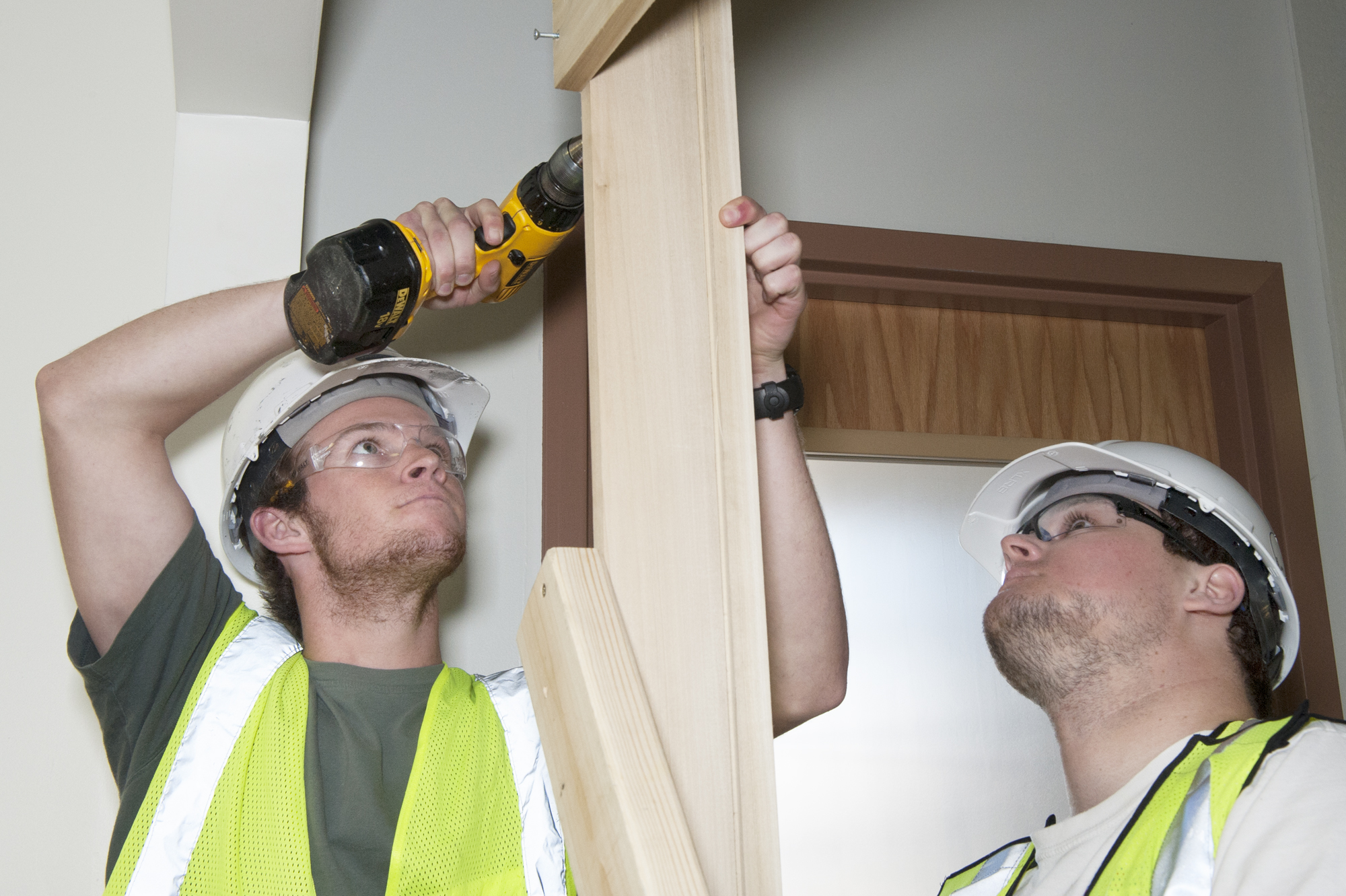 Mississippi State University junior Thomas Vinton, of Decatur, Ala., left, and senior Taylor Britt, of Madison, are among building construction science majors completing renovations of Howell Hall. The work is sponsored by the Mississippi State Board of Contractors' Construction Education Fund.