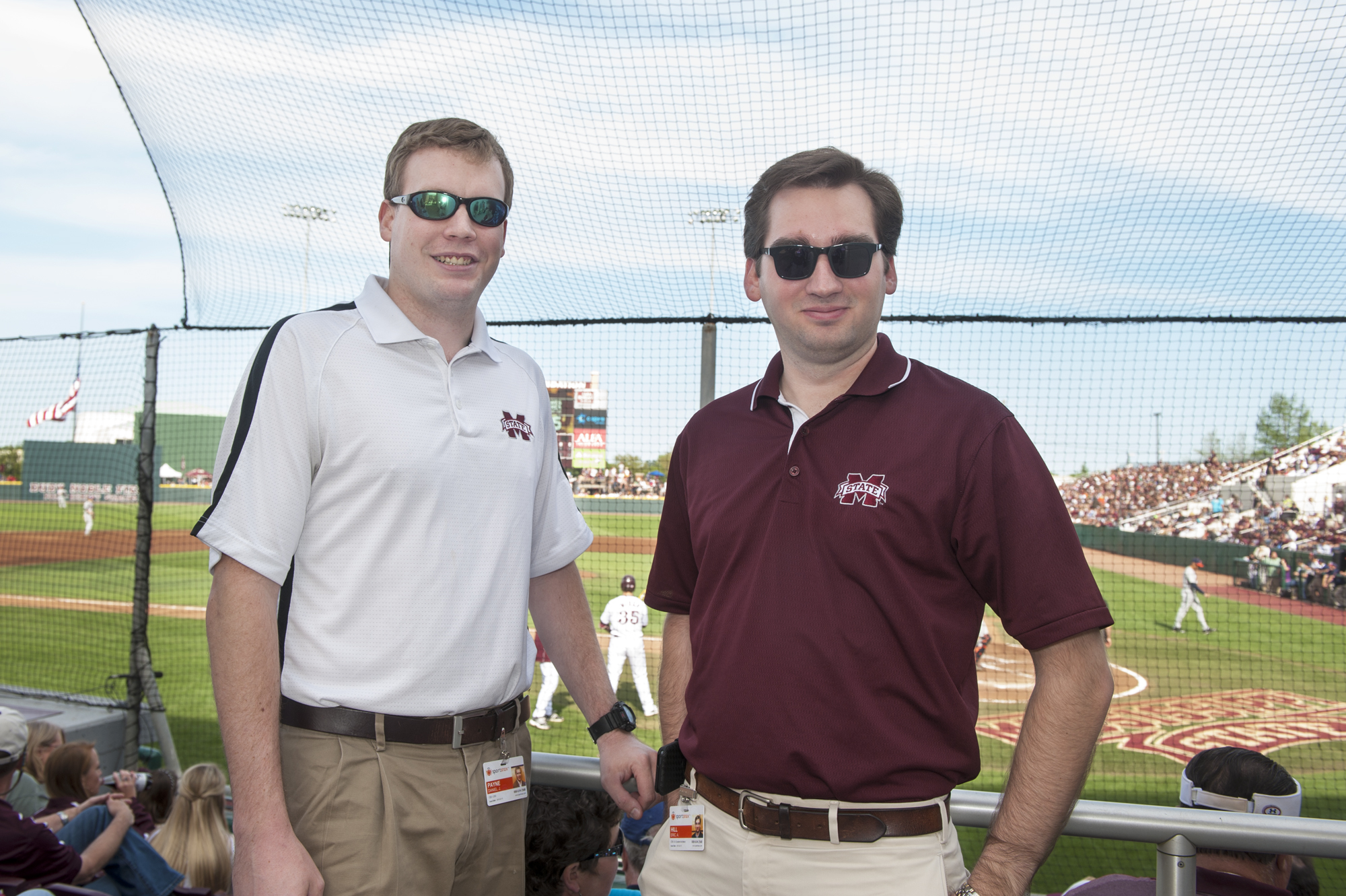 Recent MSU graduates and SportSnax founders Daniel Payne (l) and Eric Hill, during a recent baseball game at Polk-Dement Stadium. 