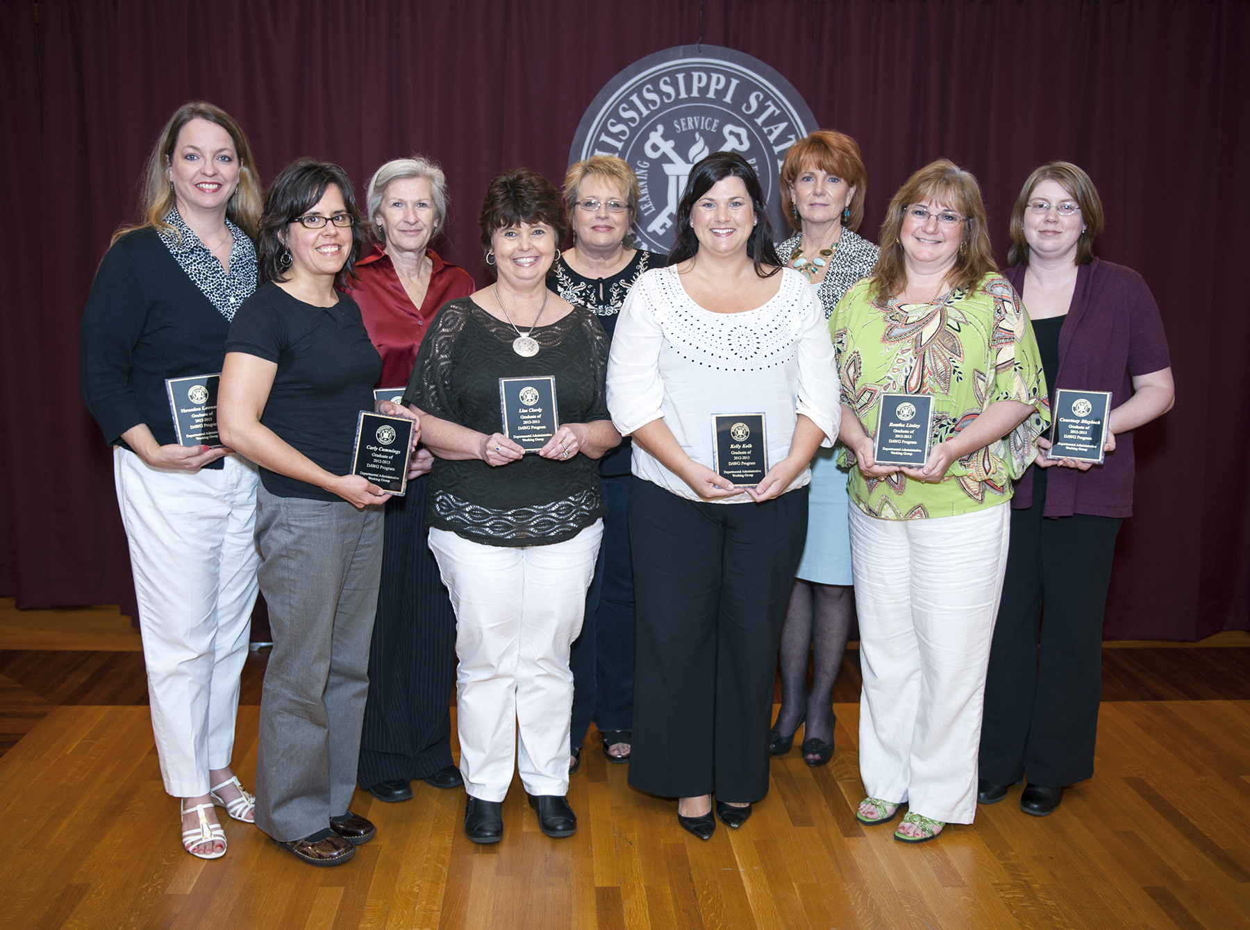 The first DAWG graduates are Veronica Leonard (l-r) Carly Cummings, Kay Davidson, Lisa Clardy, Carol Ellington, Kelly Kolb, Carol Martin, Reatha Linley and Courtney Blaylock. 