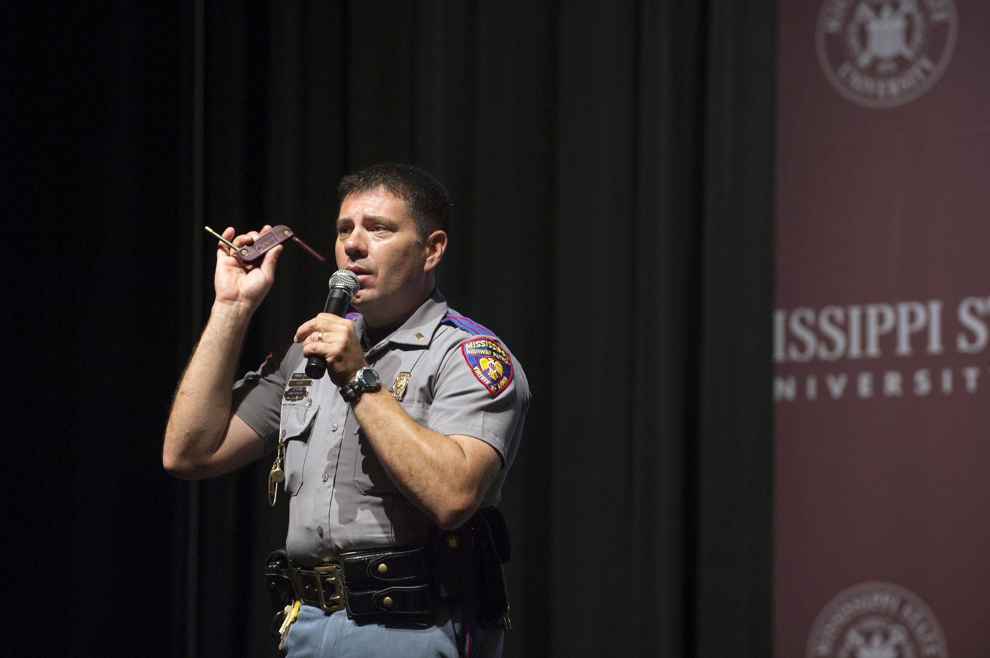 Lt. John Poulos, director of public affairs with the Mississippi Highway Safety Patrol, speaks frankly with Boys State delegates about the dangers of distracted driving and impaired driving. He shows them "the last key," which he has used to lock the coffins at funerals of many who have died an untimely death due to tragic and preventable automobile accidents.