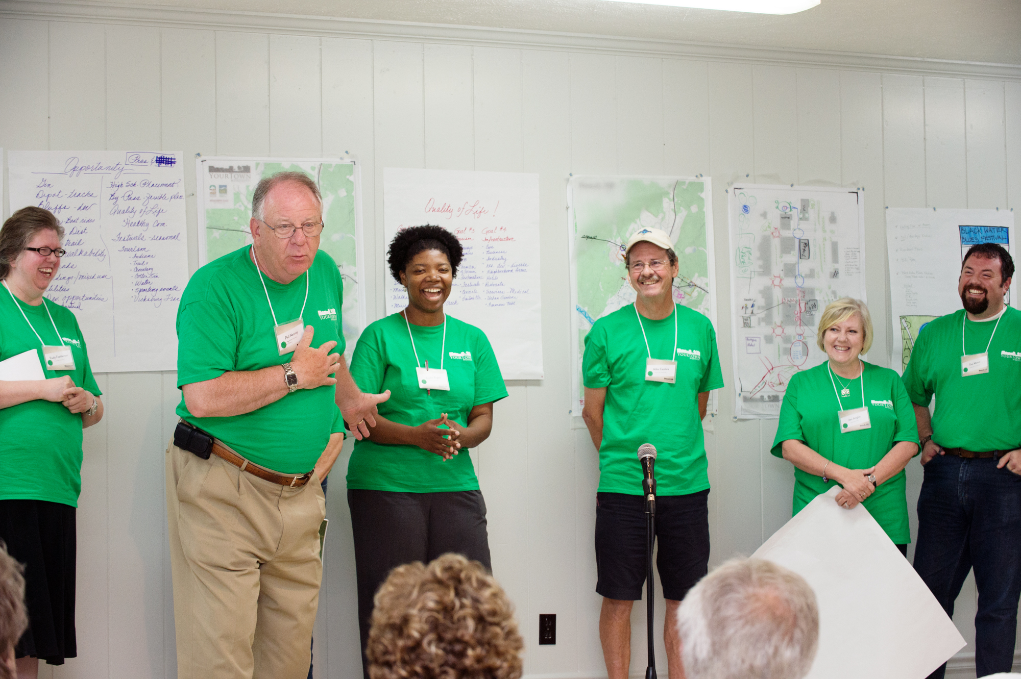 Phil Nanney of New Albany and Keisha Bogan of Okolona (second and third from left), explain their community development plans during a recent MSU-sponsored "YourTown, Miss." workshop. The interactive session teaches participants about how community development enhances economic opportunity. 