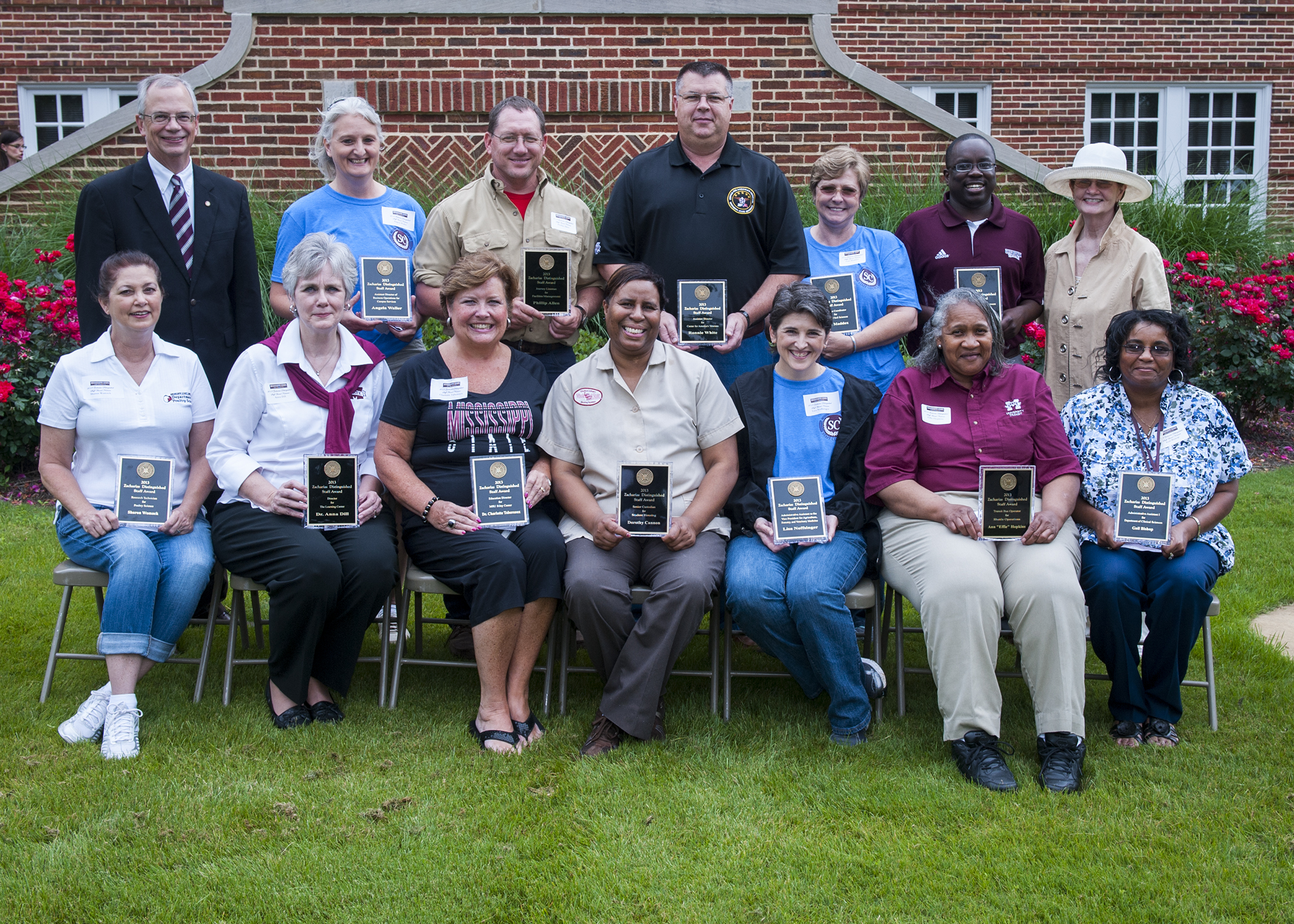 MSU Zacharias Distinguished Staff Award winners for 2013 include (front, l-r) Sharon K. Womack, Anna Dill, Charlotte Tabereaux, Dorothy Cannon, Lisa Noffsinger, Effie Anne Hopkins, Gail Bishop; presenter Jerry Gilbert, Angela Waller, Phillip Allen, Ronnie White, Gail Maddox, Dan Coleman, and presenter Tommie Zacharias. 