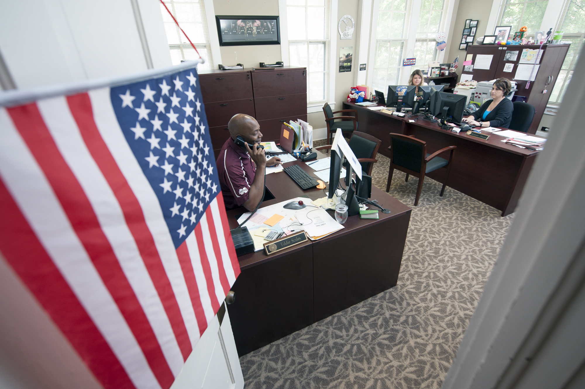 Staff at Mississippi State's G.V. "Sonny" Montgomery Center for America's Veterans work together like family to serve the student veterans, service members, dependents and survivors at the university. From left are Eddie Scales, veterans outreach coordinator; Brittany Howard, veterans benefits program counselor; and Melanie Owens, veterans benefits program coordinator.