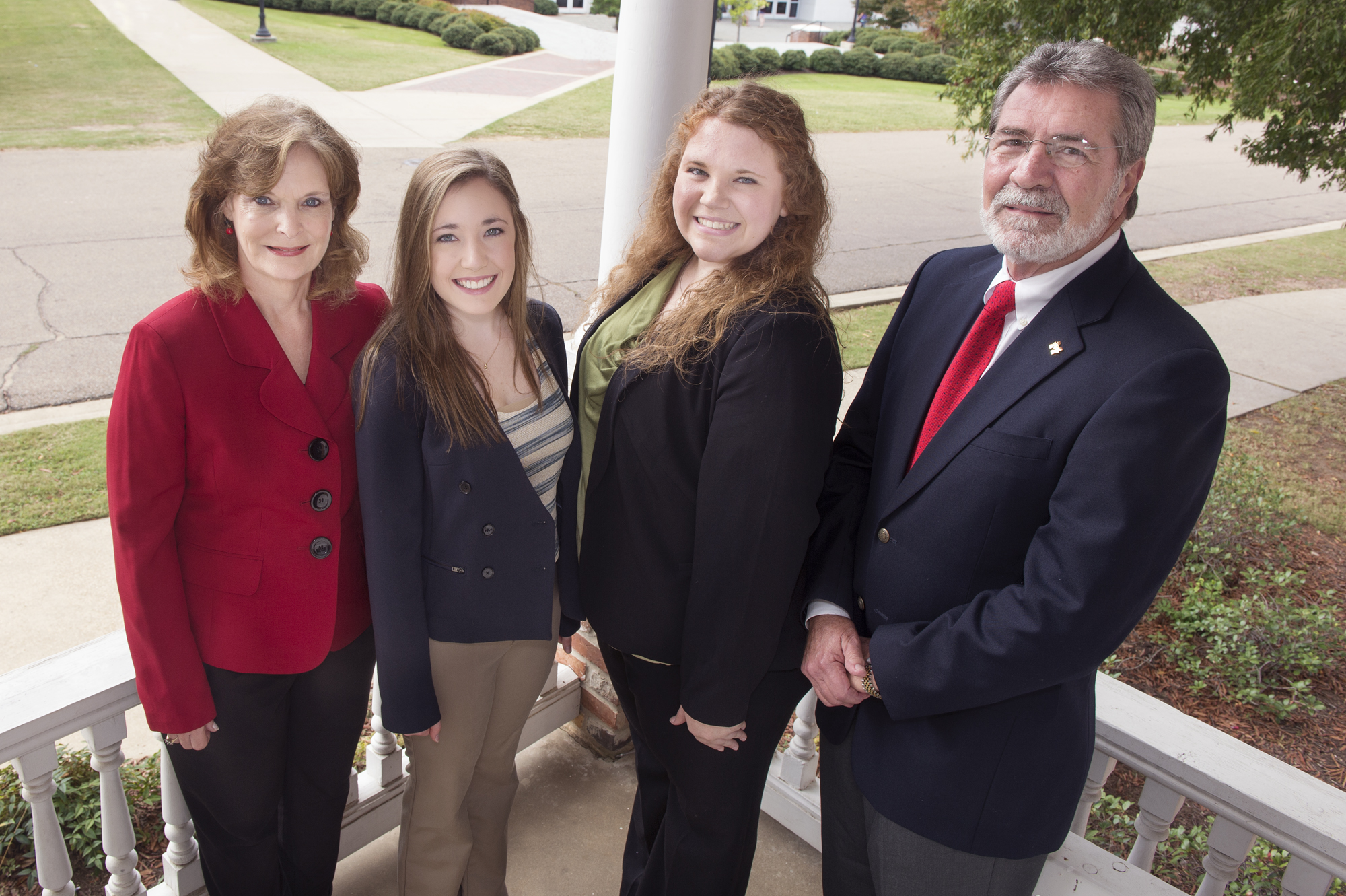 Mississippi State interior design majors Anna Strohm and Jessica Kent, center left and right, respectively, are receiving major scholarships from the American Home Furnishings Alliance. With them are Beth Miller, interim associate dean of the College of Architecture, Art and Design, and interior design program director, and Bill Martin, director of the university's Franklin Furniture Institute.