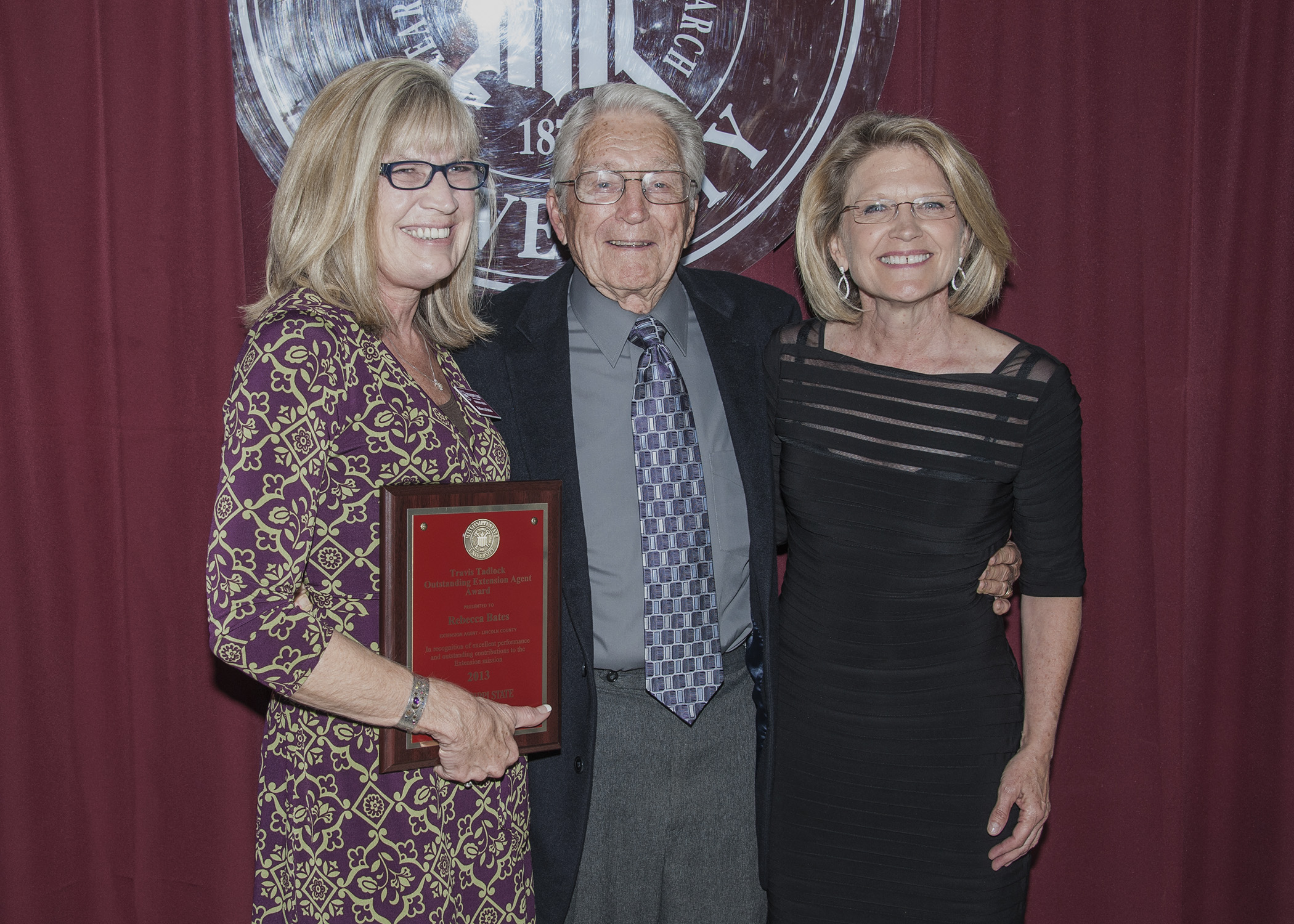 Rebecca Bates (l), with award namesake Travis Tadlock and its benefactor and his daughter, Susan Tadlock Williams. 