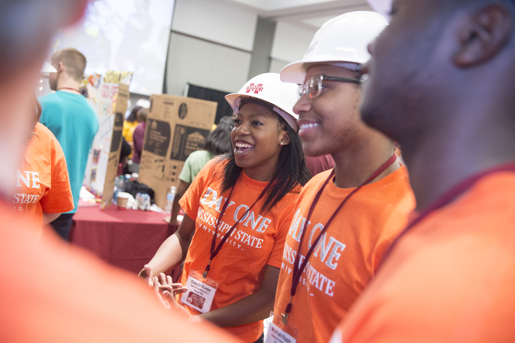 Students enjoy reviewing the fall semester's Day One projects during a recent campus showcase.