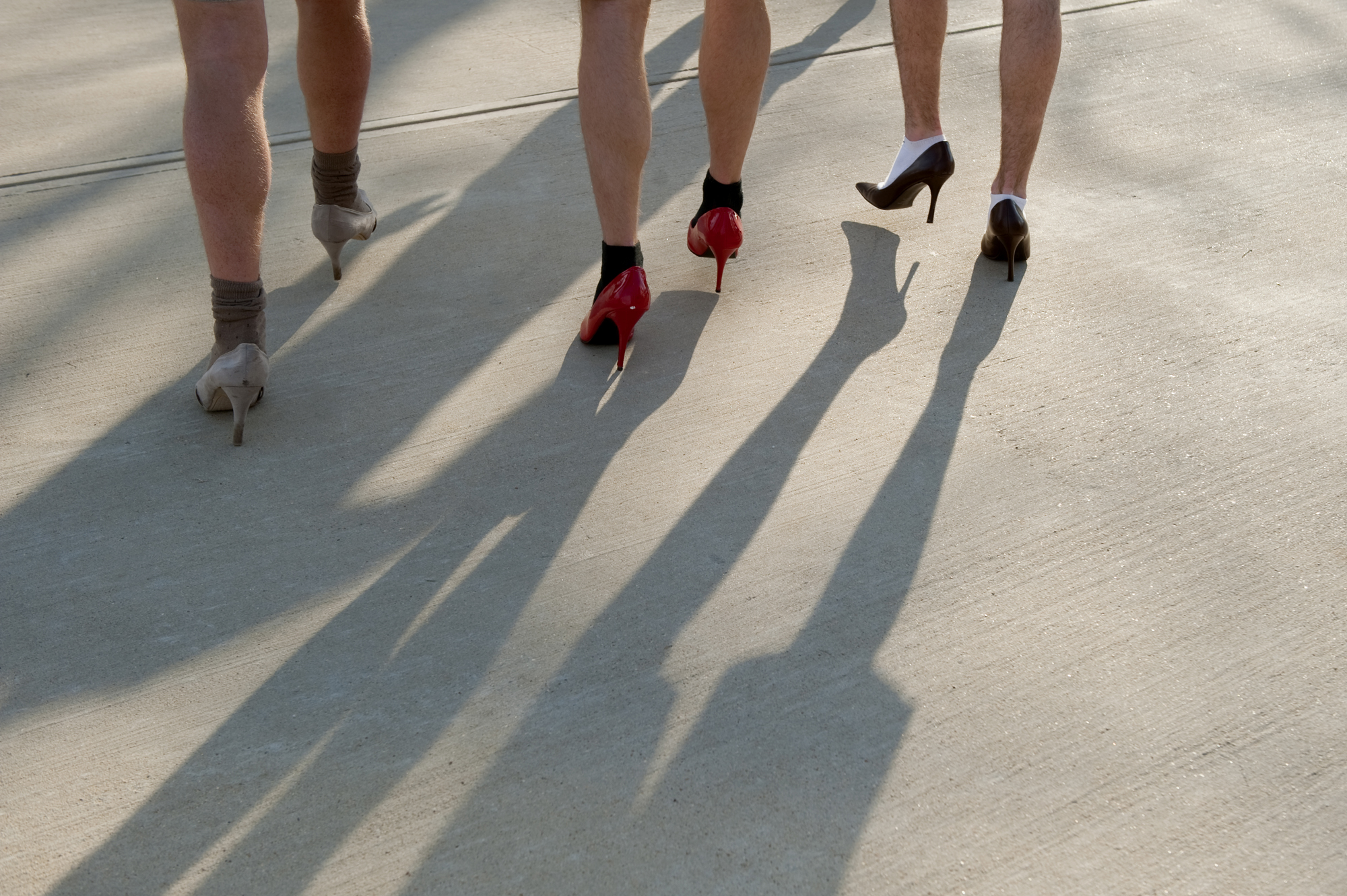 Approximately 500 men will walk one mile in women's high-heeled shoes on Monday [April 7] to show their support for ending violence against women.