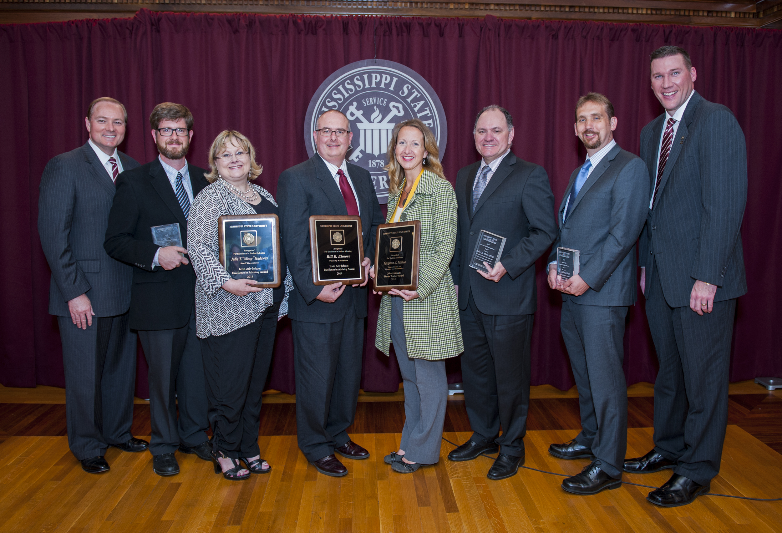 MSU's 2014 faculty honorees shown with MSU President Mark E. Keenum, left, and Alumni Association Executive Director Jeff Davis, right, are (from left) Cory Gallo, Julie "Missy" Hadaway, Bill Elmore, Meghan Millea, Robert Moore and Wes Schilling. 