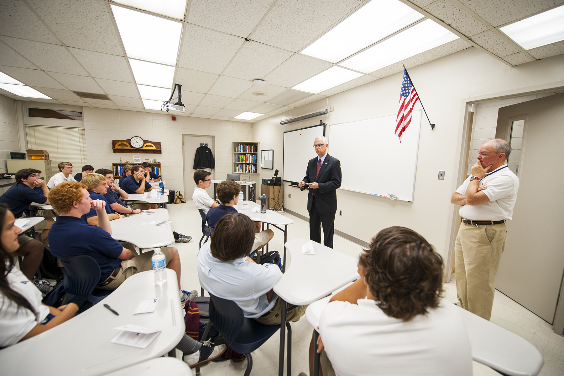 Mississippi State Provost and Executive Vice President Jerry Gilbert talks with Jackson Academy seniors enrolled in an MSU engineering course offered through a partnership by MSU and Jackson State University, while the course professor Kenneth Hughey, right, listens along with his class. 