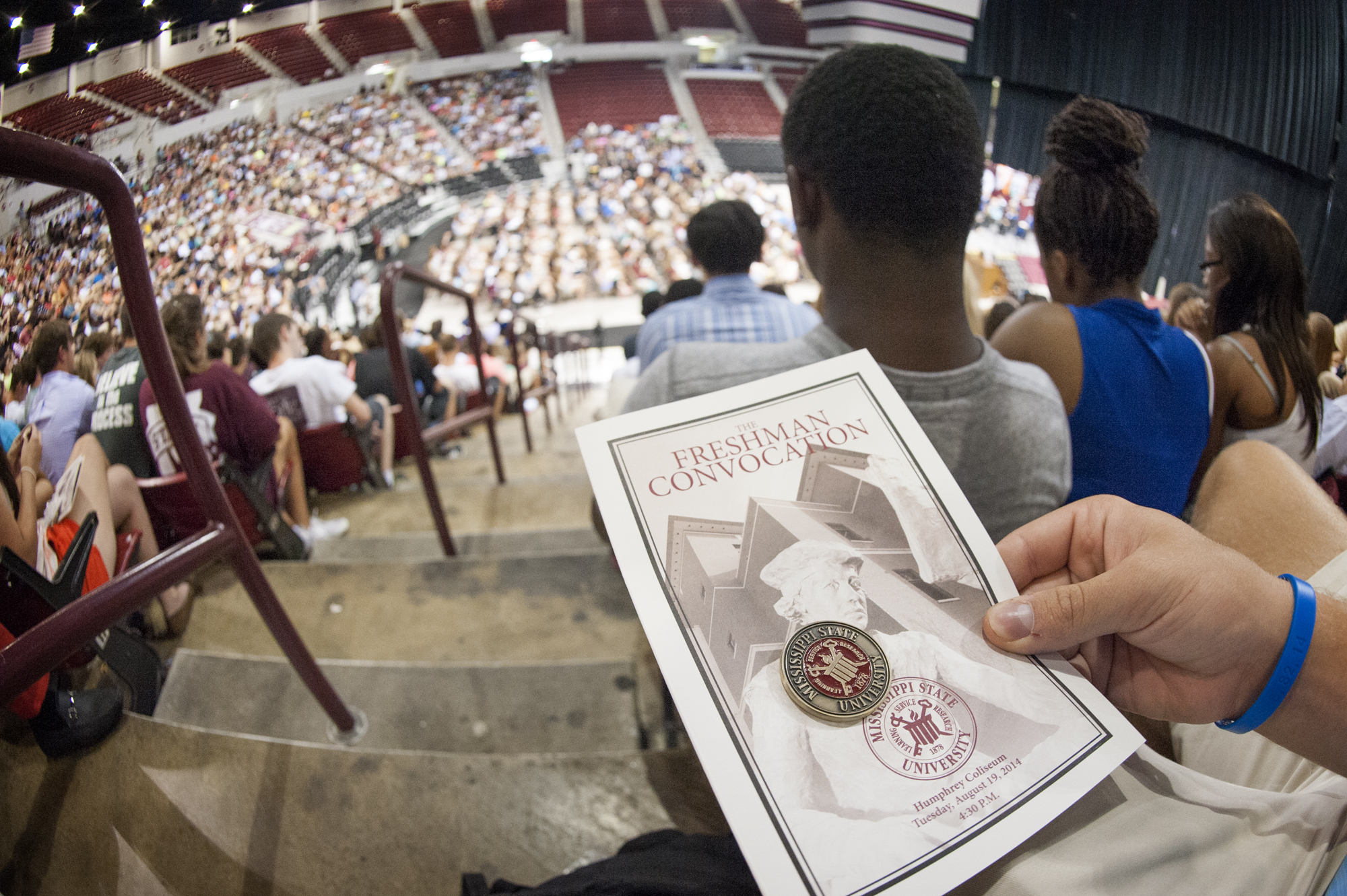 All 3,000 members of Mississippi State University's freshman class, the Class of 2018, received commemorative coins at the inaugural Freshman Convocation. 