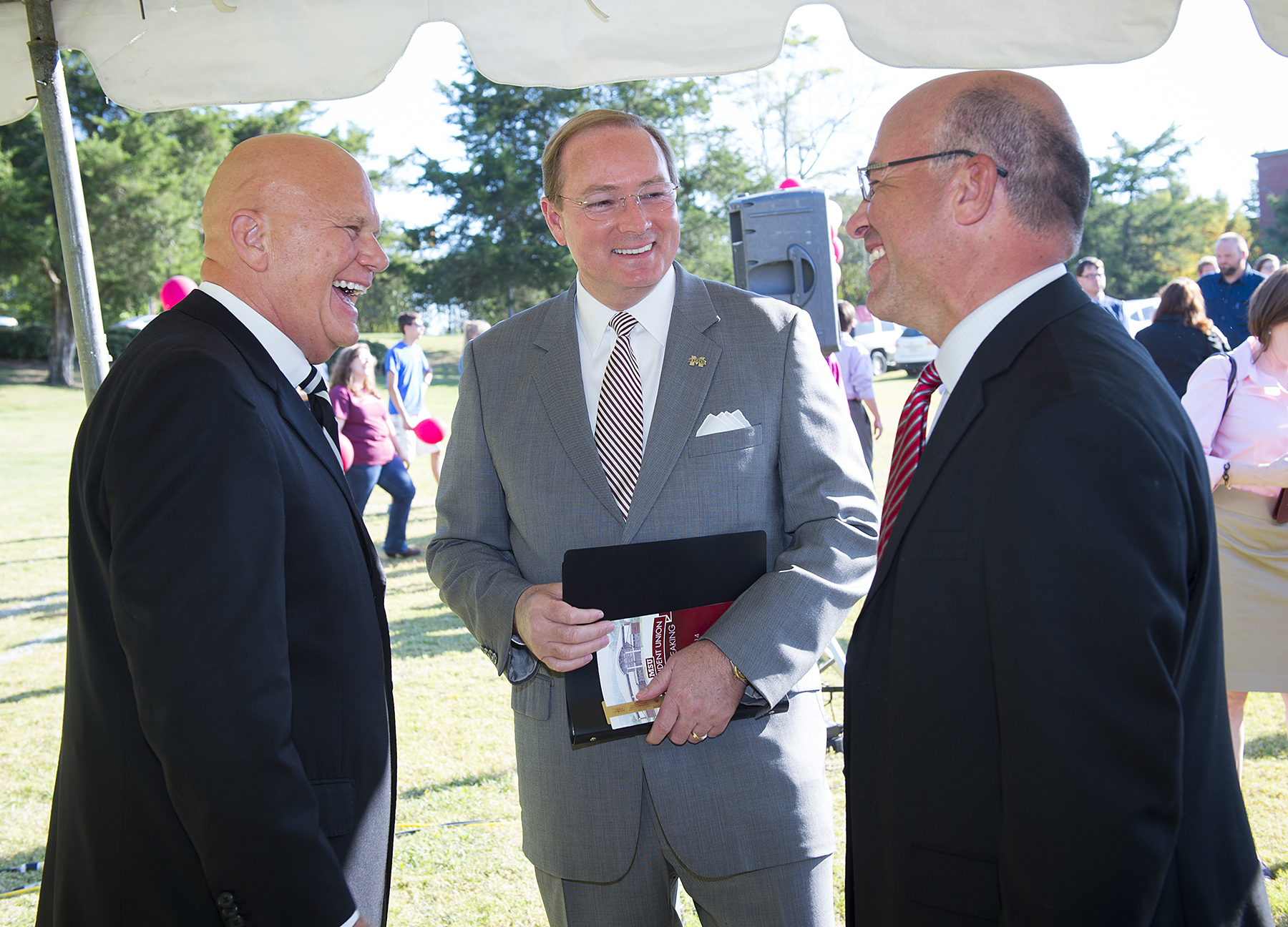 Mississippi Baptist Convention Board Executive Director Jim Futral, (from left) talks with MSU President Mark E. Keenum and BSU Director Michael Ball at the groundbreaking ceremony Tuesday.