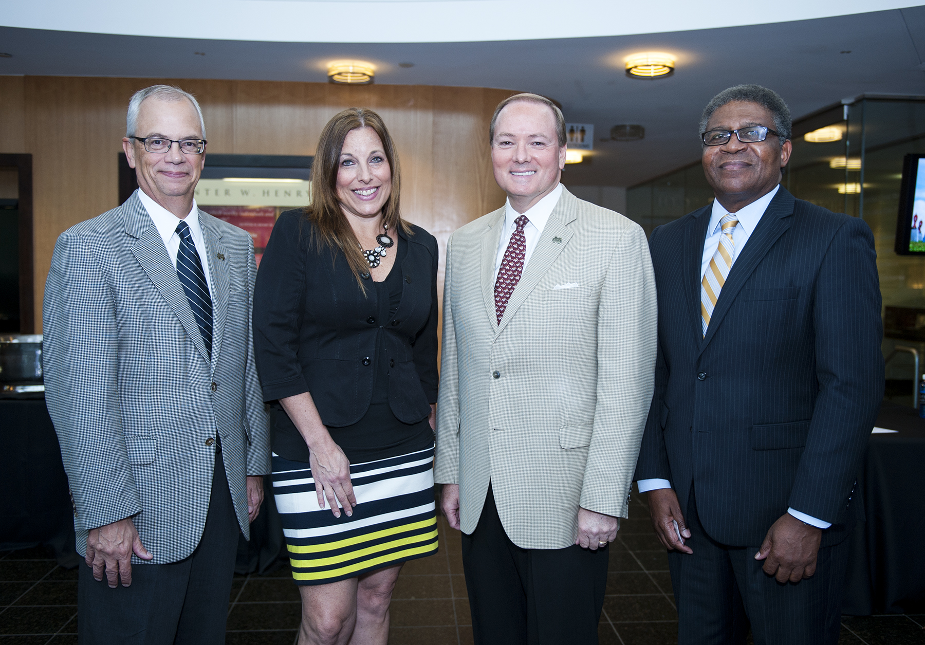 The Women and Minority Vendor Fair, held at Mississippi State University on Tuesday [Oct. 14], offered supplier-businesses owned by women and minorities to meet potential vendors. From left are MSU Provost and Executive Vice President Jerry Gilbert, Mississippi University for Women Resources Management Director Angie Atkins, MSU President Mark E. Keenum and Mississippi Development Authority Minority and Small Business Development Director Bob Covington.