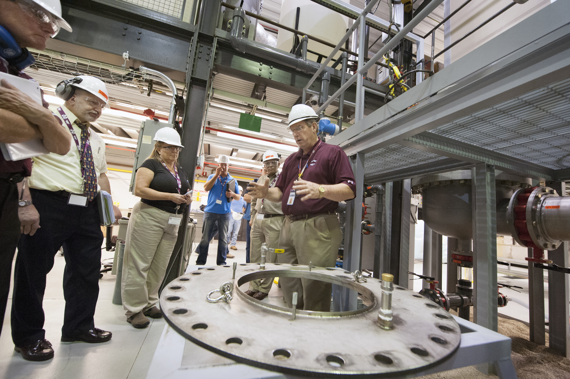 Charles Waggoner, right, deputy director of ICET and Mississippi State research professor, hosts a tour of visitors including Department of Energy officials and nuclear energy industry leaders from across the country who came recently to observe testing technology which assesses nuclear grade high-efficiency particulate air (HEPA) filtration systems.