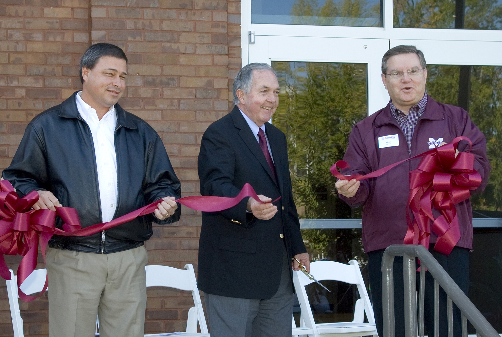 Officially opening MSU's new agricultural and biological engineering building were (l-r) department head Bill Batchelor, division vice president Vance Watson and Glenn Steele, interim dean of the Bagley College of Engineering.