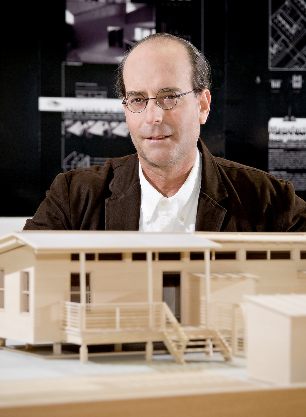 MSU architecture professor Michael Berk shows a model of GreenMobile.