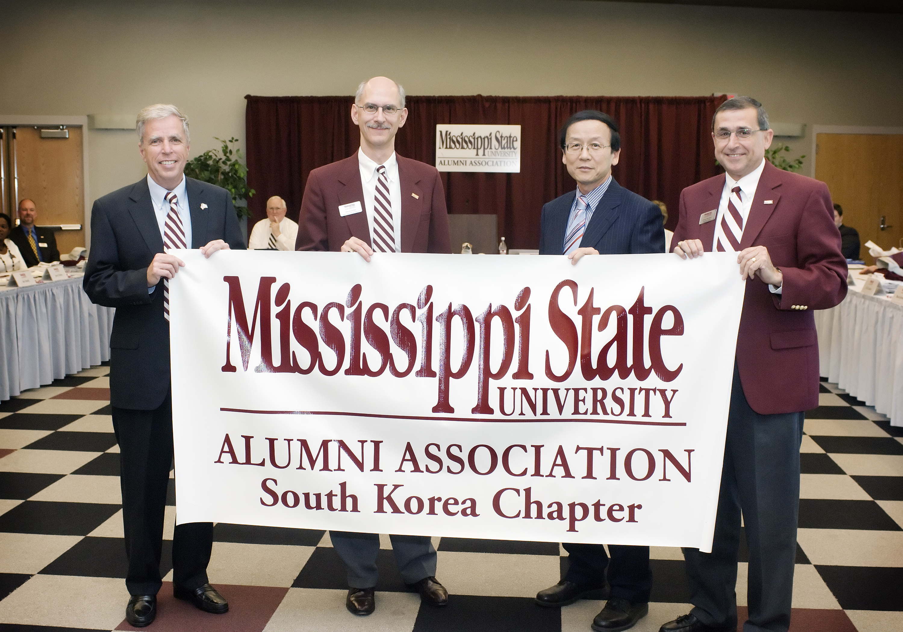 Welcoming the new MSU alumni chapter in South Korea were (l-r) Foglesong, Jones, Shim, and Abraham.