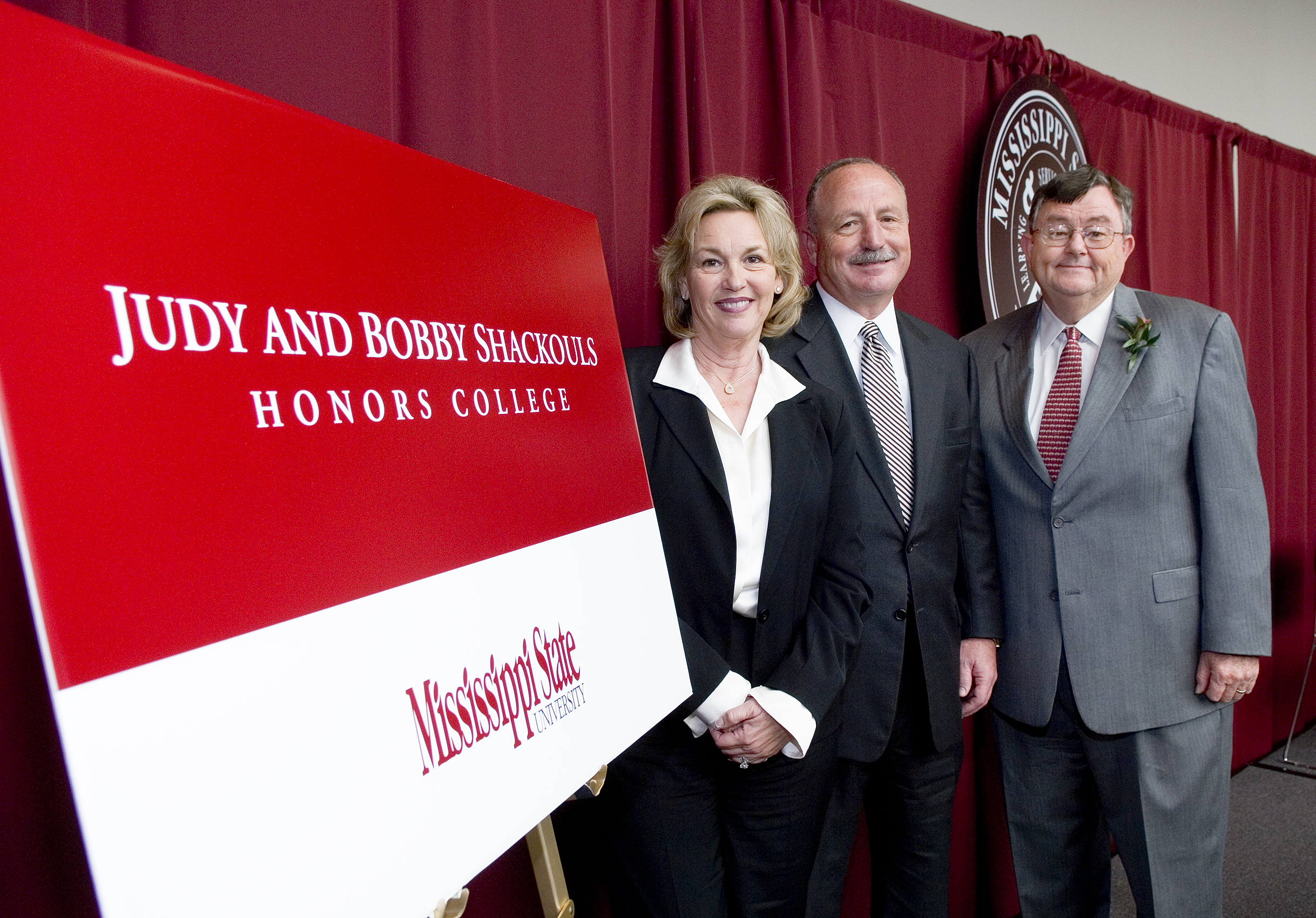 During a Tuesday campus ceremony, retiring Mississippi State President Charles Lee (r) announced a $10 million gift to the university from Judy and Bobby Shackouls. The Houston, Texas, couple is endowing an honors college to be named in their honor at the 128-year-old land-grant institution.  Bobby Shackouls, (c) a 1972 MSU chemical engineering graduate from Greenville, recently retired as  president and chief executive officer of Burlington Resources Inc. 