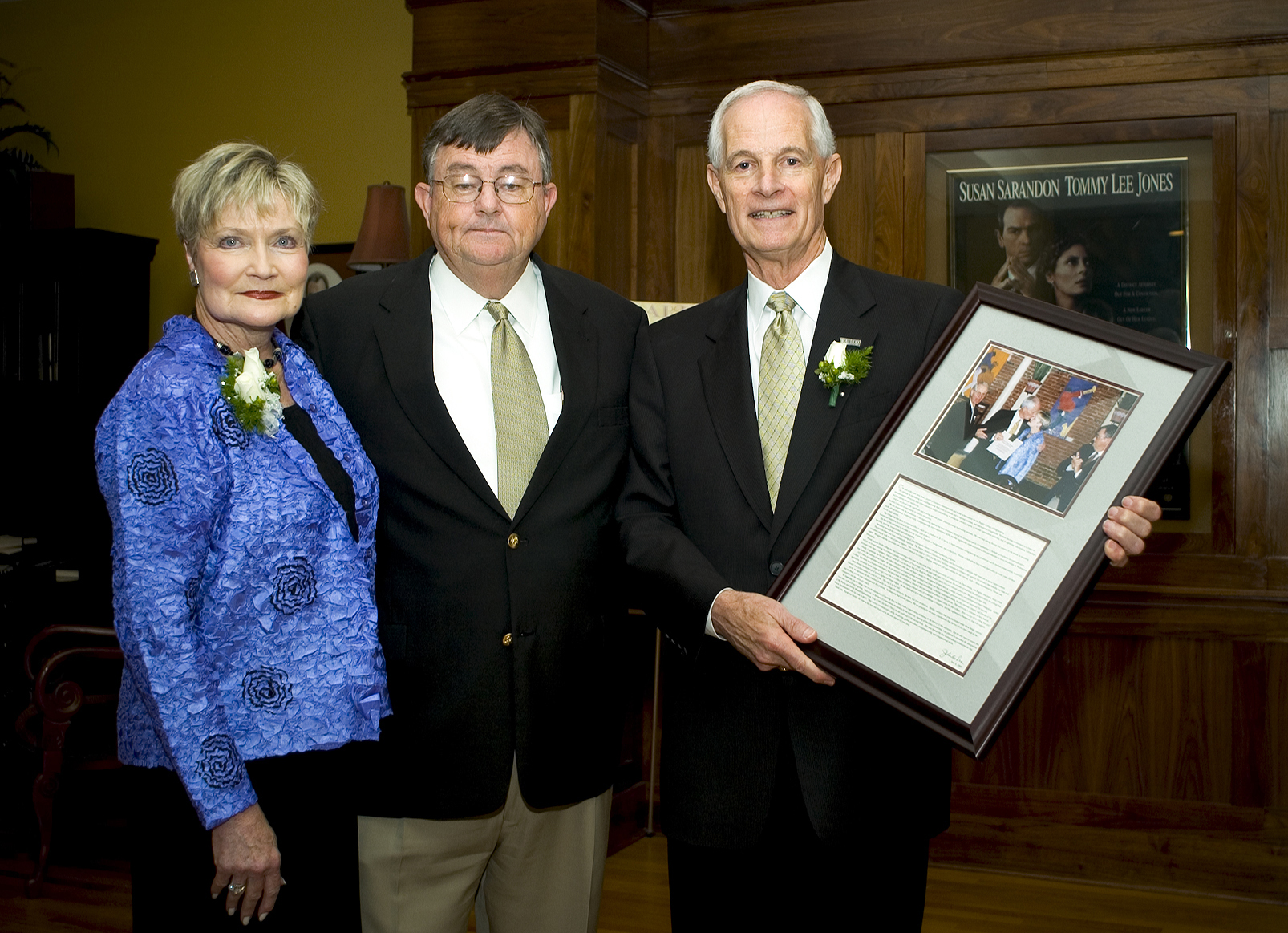 <br /><br />
Retiring Bagley College of Engineering dean A. Wayne Bennett displays a parting memento presented by Mississippi State president Charles Lee (c) during a recent ceremony. Lee announced Friday MSU is naming a wing of the engineering college's oldest building, McCain Hall, to honor Bennett and his wife, Shirley (l). Bennett retires June 30 after serving as dean for the past eight years. The momento is a framed photo of the couple and a statement from Lee marking Bennett's service to the university.<br /><br />
 