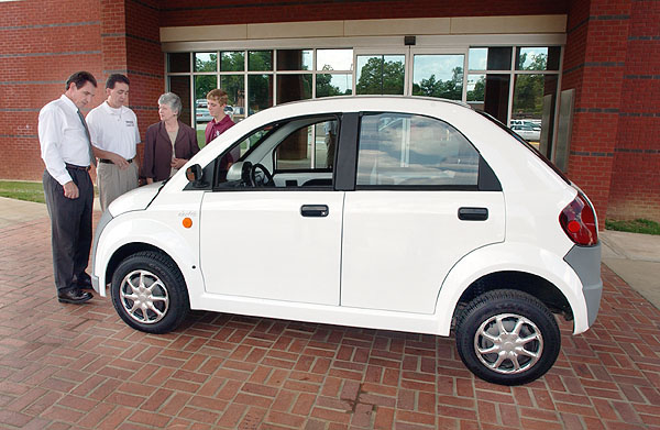 <br /><br />
MSU rehabilitation engineer Andy Whetstone (second from left) inspects the prototype with Ed Butler (left) and Jane Taylor of the Mississippi Council on Developmental Disabilities and junior Jacob Davis, a mechanical engineering major who works at the Martin Center. 