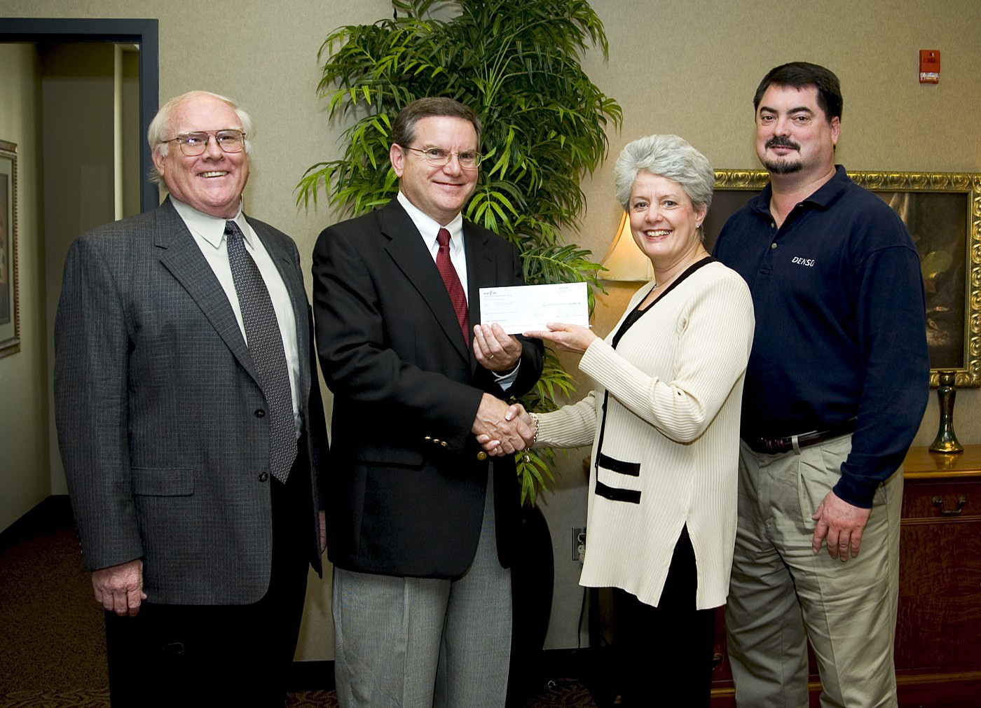 <br /><br />
Barbara Wertheimer, secretary and program officer for DENSO North America Foundation, presents a $30,000 check to Glenn Steele, interim dean of Mississippi State's Bagley College of Engineering. The gift will fund the purchase of a Pro 800 dynamometer that MSU engineering students will use in designing and building a small formula-style racing car for international competition next year. Also participating in the presentation ceremony were Keith Hodge (l), interim head of MSU's mechanical engineering department and Russell Bearden, supervisor of staffing for DENSO Manufacturing Tennessee at Maryville, Tenn.<br /><br />
 