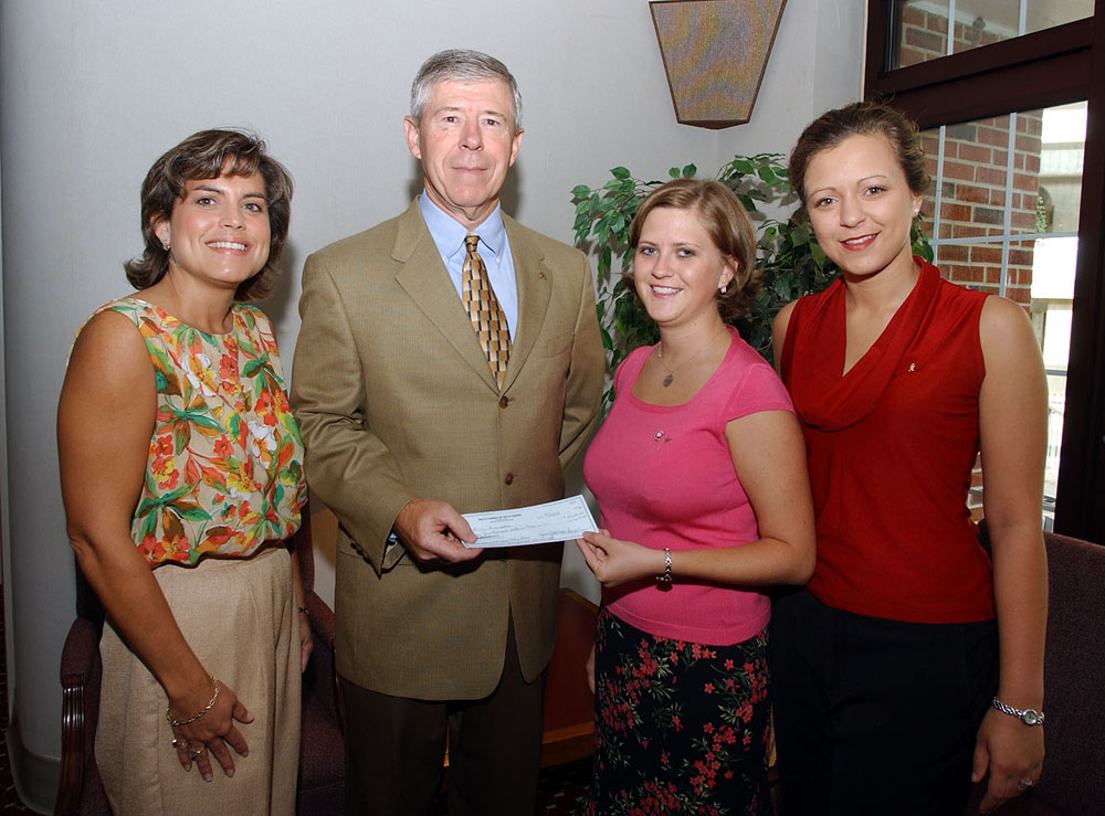 <br /><br />
MSU Delta Gamma treasurer Sarah Crain of Holly Springs (second from right) and vice president Kathryn Adamson of Birmingham, Ala., (right) present a Martin Lectureship endowment check to MSU Foundation officers Trish Hughes and Richard Armstrong.  Hughes is director of special giving Armstrong, executive director. 