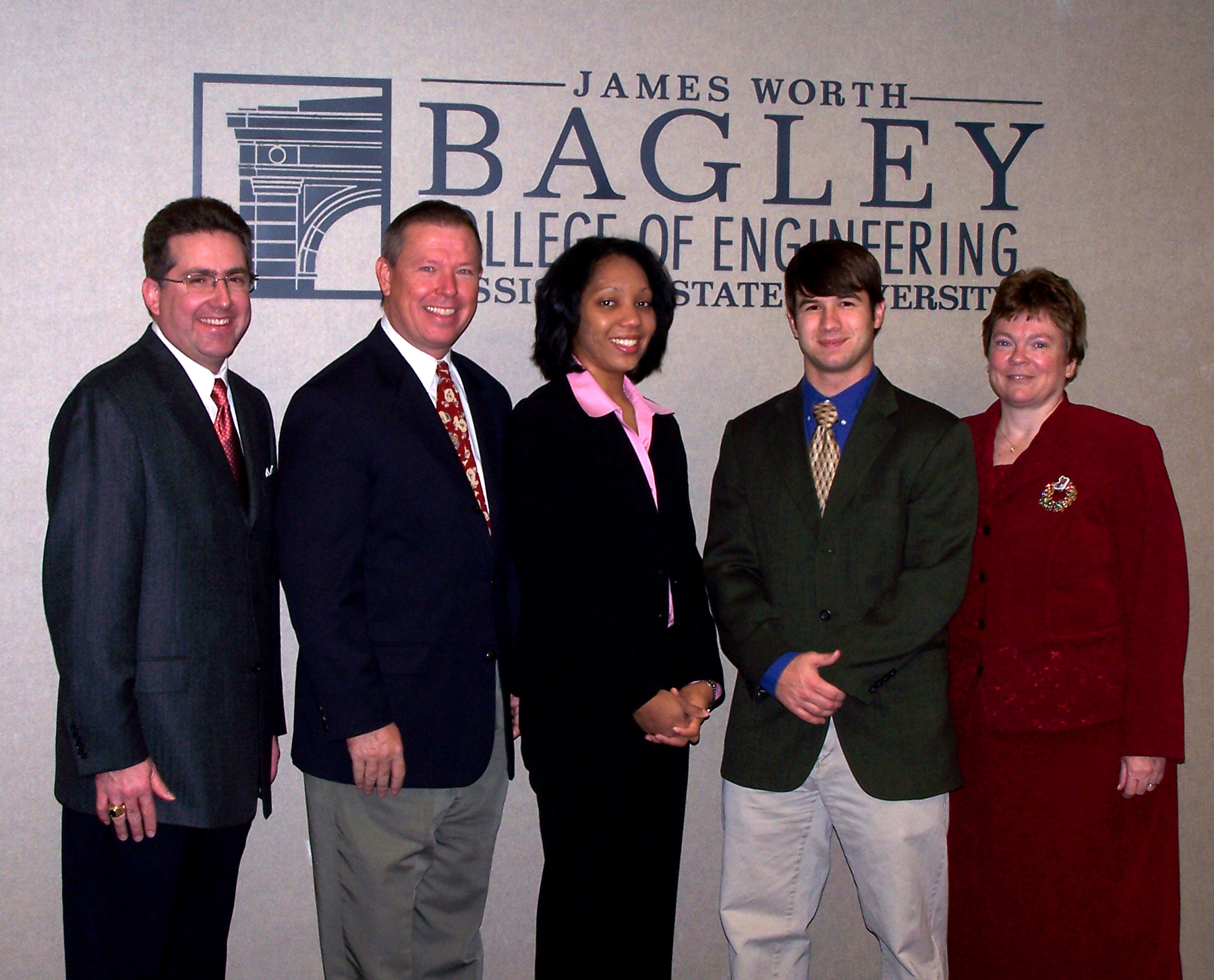 Graduating engineering students Christina Smith of Greenwood and Norman Cruse of Okolona (third and fourth from the left) are the latest recipients of the Jack Hatcher Entrepreneurship Certificates through a university program that promotes careeers combining technical and business skills. Joining them for a recognition ceremony were (from left) Kirk  H. Schulz, dean of the Bagley College of Engineering; Gerald Nelson, Hatcher Chair and director of the college's entrepreneurship program; and Donna Reese, associate engineering dean for academics and administration.