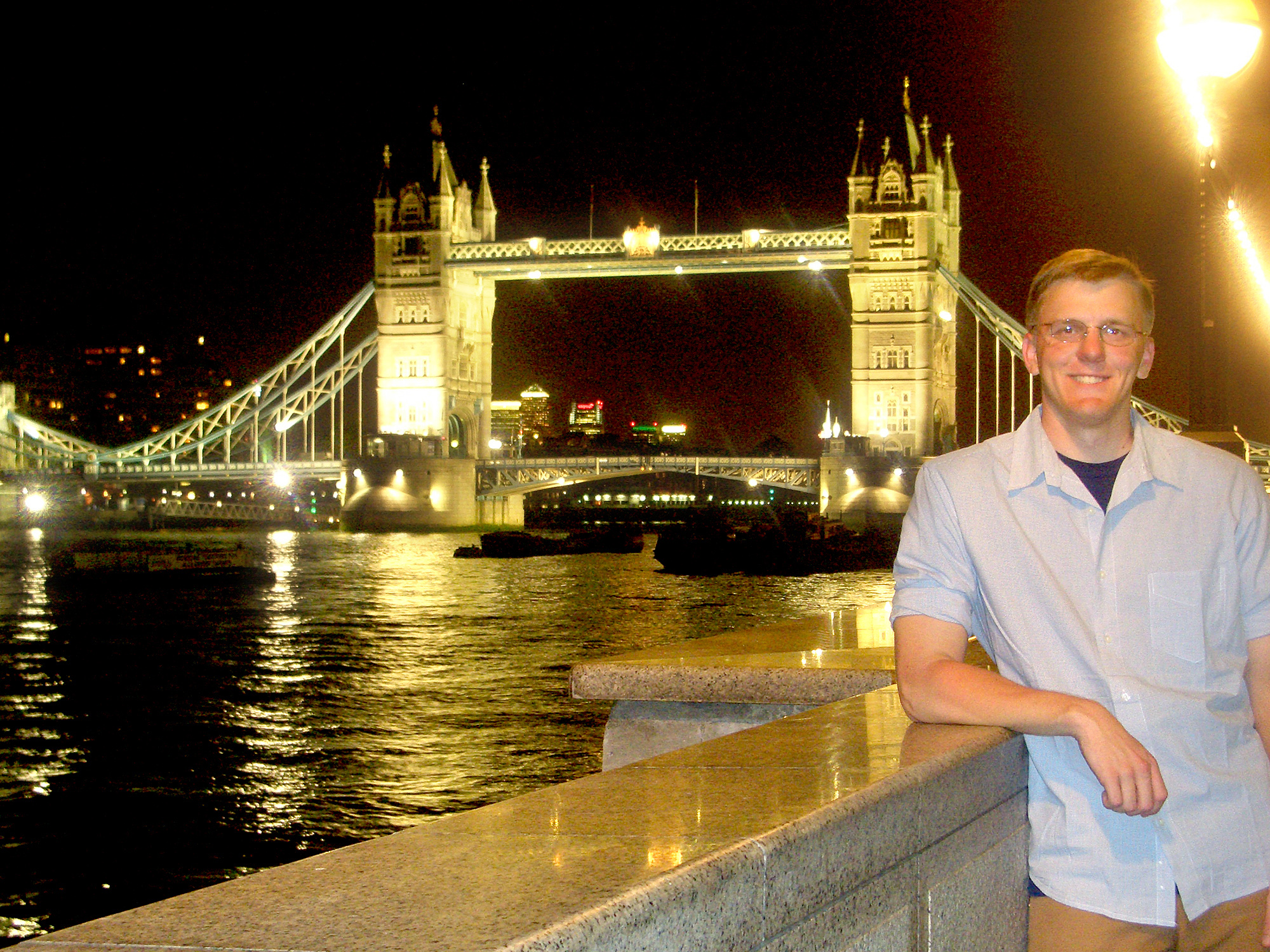 Kyle Frazier and London's Tower Bridge at night during study-abroad visit to England