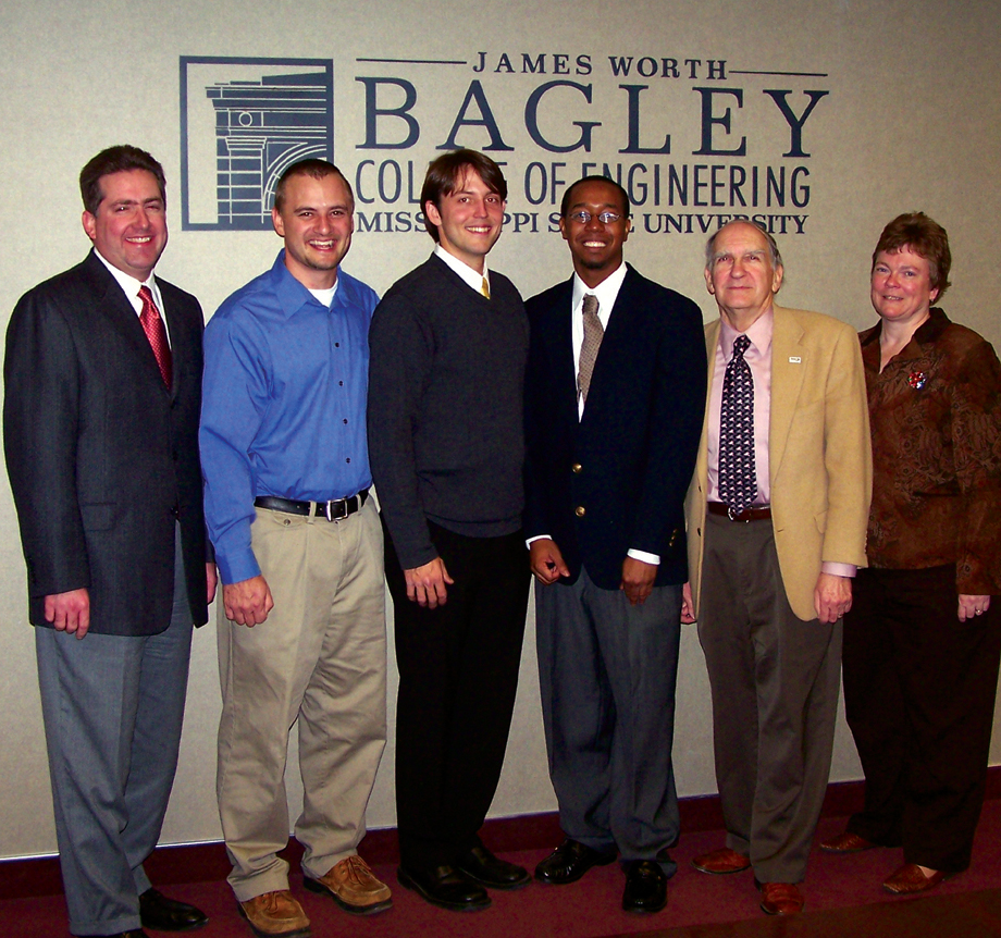 Mississippi State students Justin R. Jackson of Biloxi and Johnny Sanders of Vicksburg (third and fourth from the left) are 2005 recipients of Materials Certificates in the Bagley College of Engineering. Another Vicksburg native, Dustin H. McKnight (not pictured), also received the certificate along with the other recipients prior to MSU's fall commencement ceremonies. All three are graduate students in mechanical engineering. The Materials Certificate program recognizes students who complete an organized plan of study in the interdisciplinary materials engineering and science areas at MSU. Also pictured (from the left) are engineering Dean Kirk H. Schulz, associate professor of forest products Rubin Shmulsky, mechanical engineering professor John T. Berry and college Associate Dean Donna S. Reese.