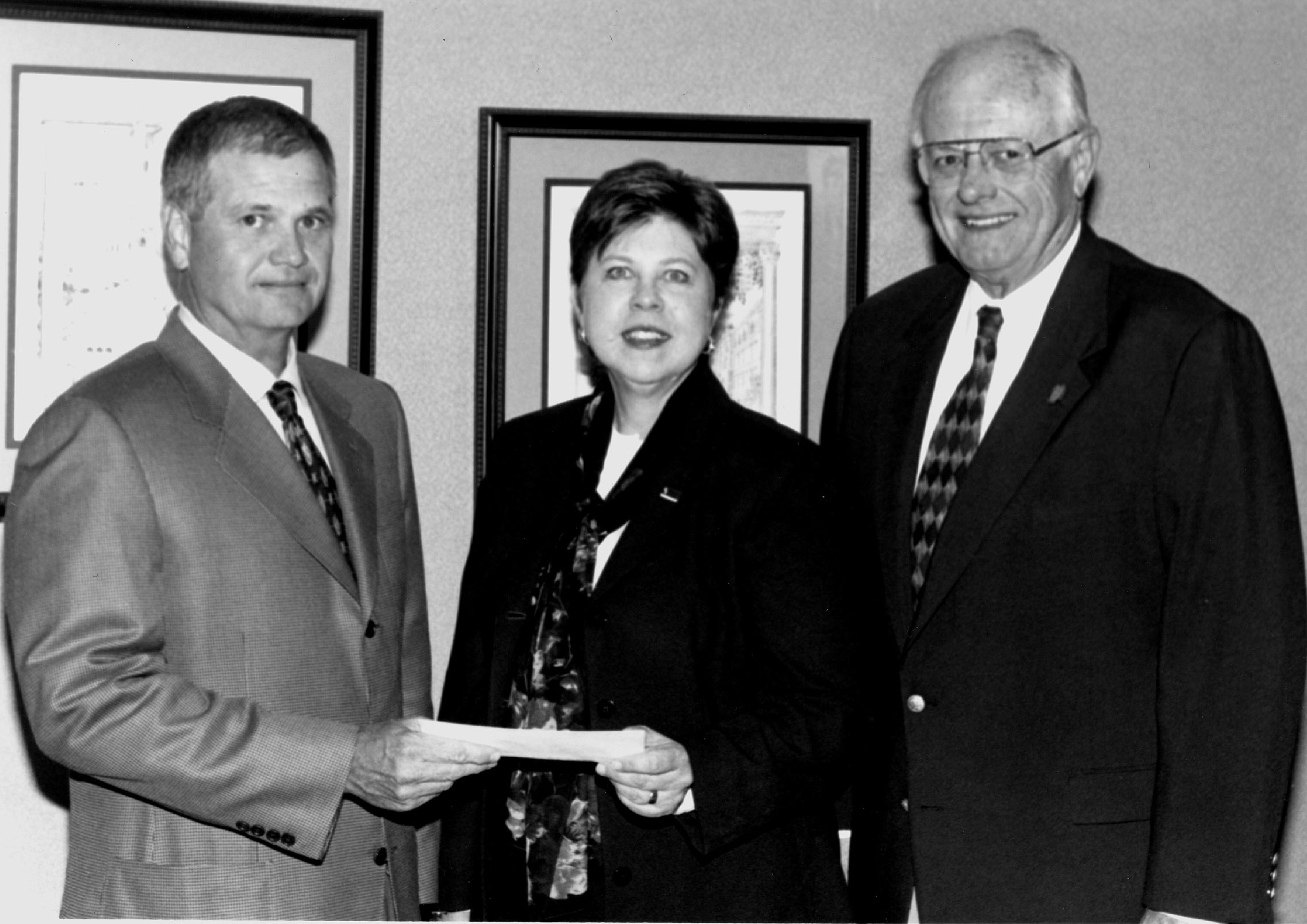 <br /><br />
MMA chairman Roger Bland (l) with MSU business dean Sara Freedman and MMA President Jerry McBride.  