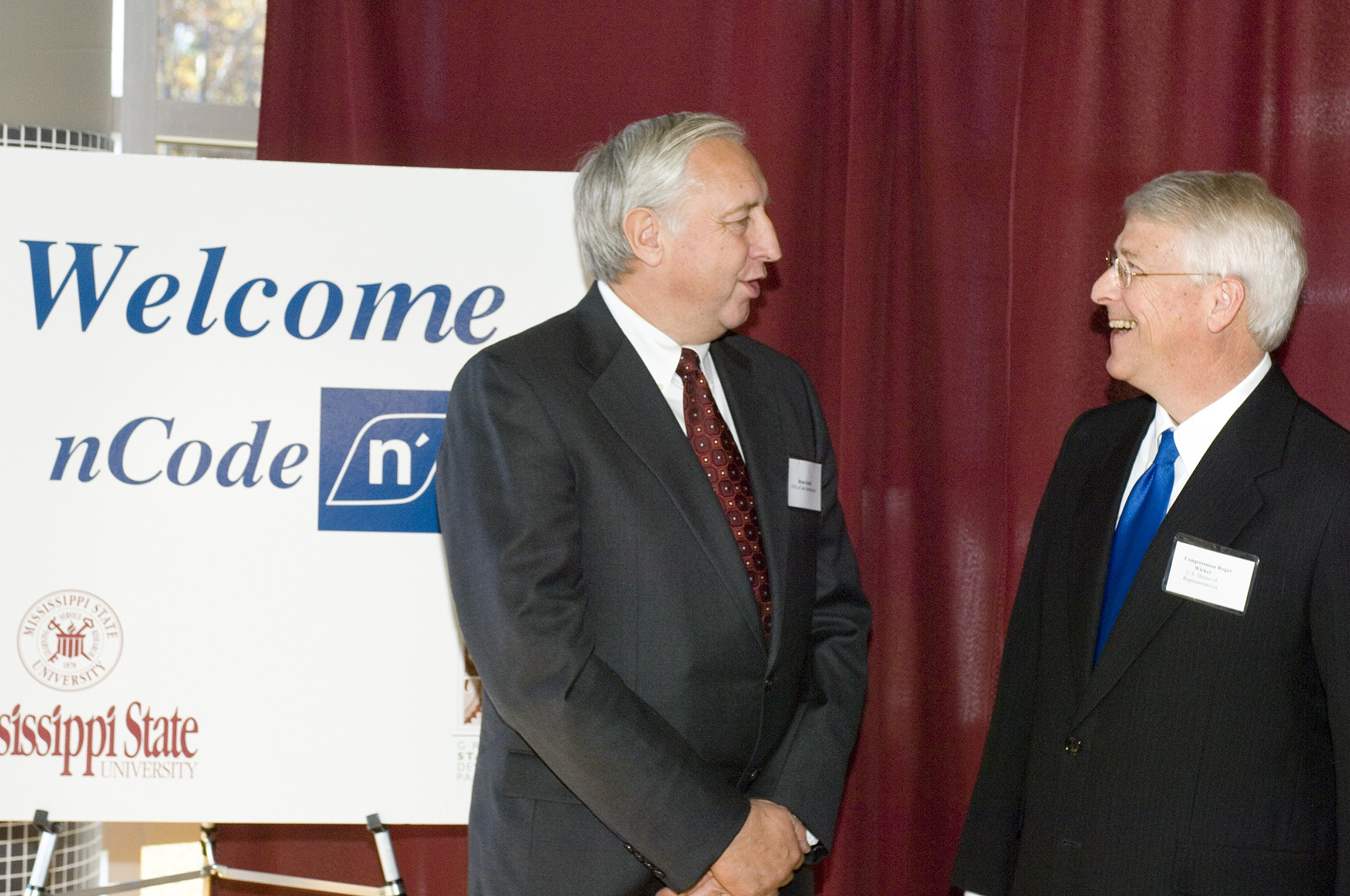 nCode International CEO Brian Dabell (left) chats with U.S. Rep. Roger Wicker, R-Miss.