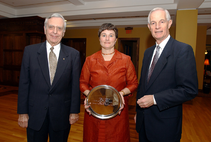 <br /><br />
Noel N. Schulz received the Eta Kappa Nu national honor society's MacDonald Award from Paul Jacobs of Starkville (l), former MSU department head and an EKN officer.  Also pictured is engineering dean Wayne Bennett. 