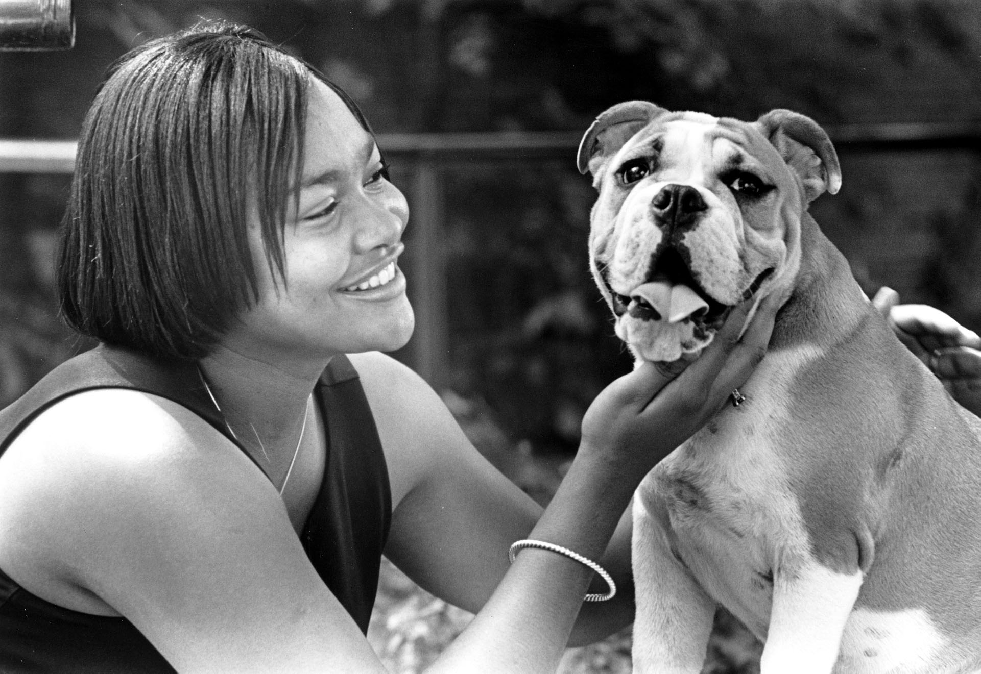 <br /><br />
"TaTonka Gold," MSU's latest bulldog mascot, gets an admiring hand from sophomore Tiffany Smith of Tupelo 