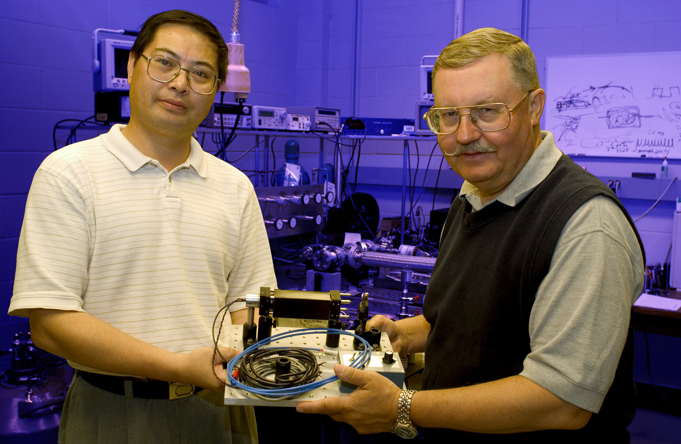 <br /><br />
Chuji Wang (left) and John Plodinek 