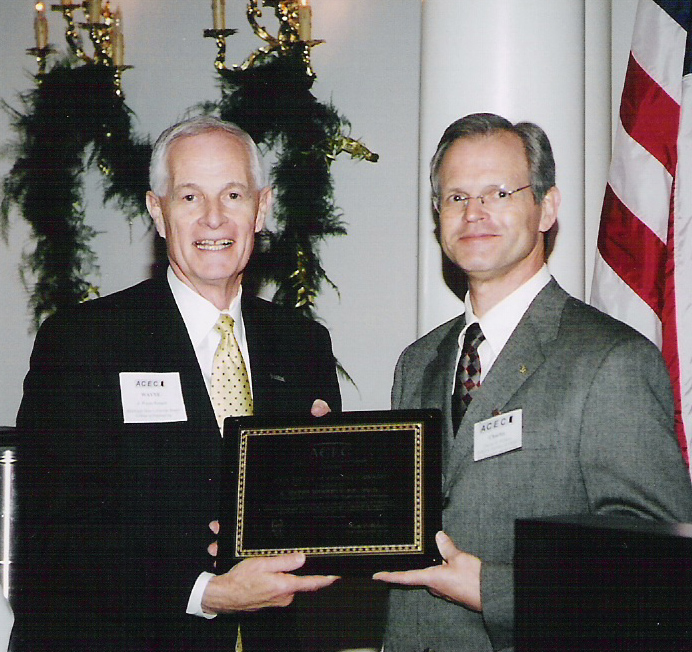 <br /><br />
ROOSEVELT AWARD--Mississippi State engineering dean A. Wayne Bennett (l) accepts the 2004 Teddy Roosevelt Award from Charles Williford, president of the American Council of Engineering Companies/Mississippi during a recent banquet in Jackson. The award recognizes individuals for outstanding contributions to the engineering profession. 